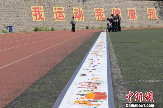 世界上最长的布头画长卷《童子闹春图》