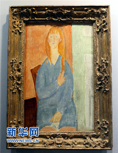 莫迪里安尼1919年作品《垂发而坐的女孩》