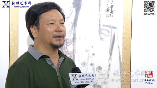 著名书画家游明元接受张雄艺术网采访