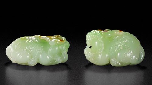 作者：徐云栋   名称：白玉瑞兽把件  成交价：230,000元