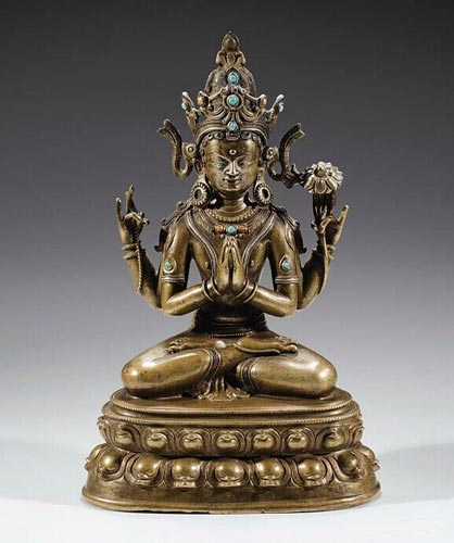 Lot 32 十三世纪 铜四臂观音坐像 高25.6cm