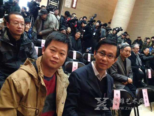 张雄书画院馆长陈家心与著名画家何家英先生合影