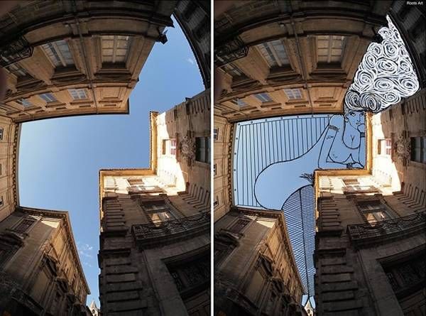 牛人艺术家在楼宇间的狭窄天空中作画