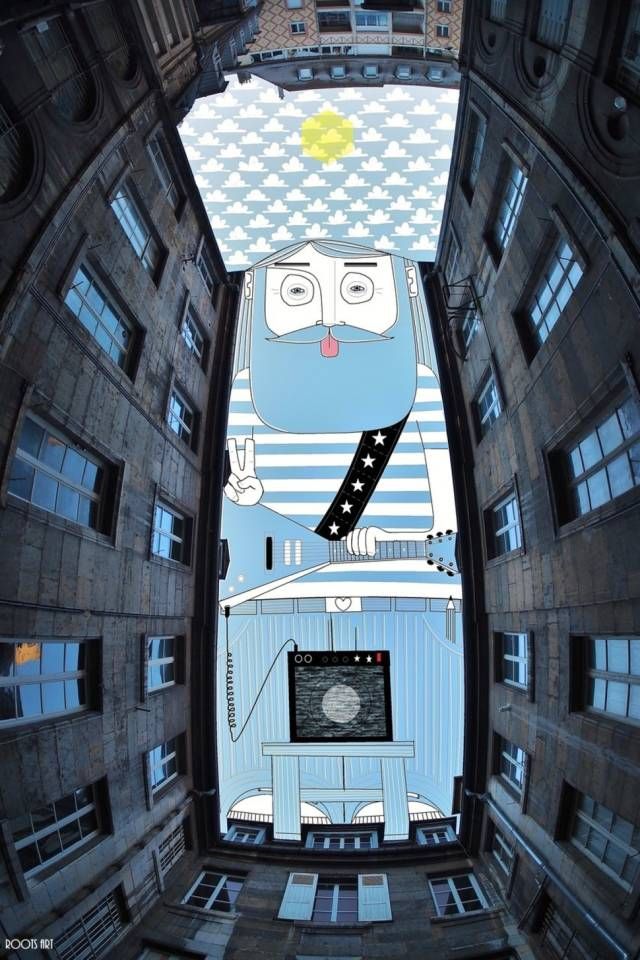牛人艺术家在楼宇间的狭窄天空中作画