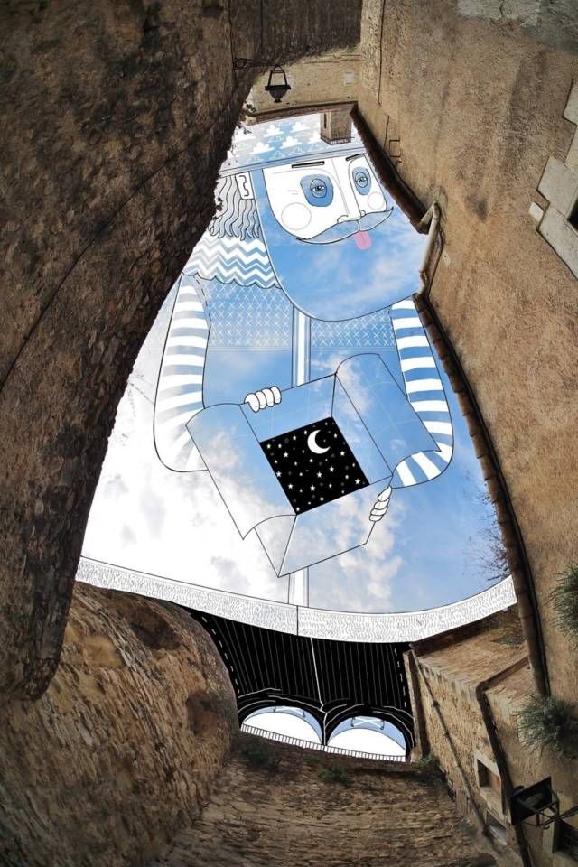 牛人艺术家在楼宇间的狭窄天空中作画