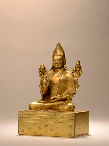 上师  