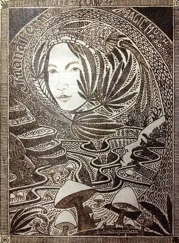 艺术家在太阳下用放大镜画画