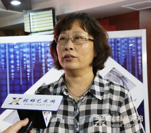 张雄艺术网记者采访美术报福建工作站主任廖申
