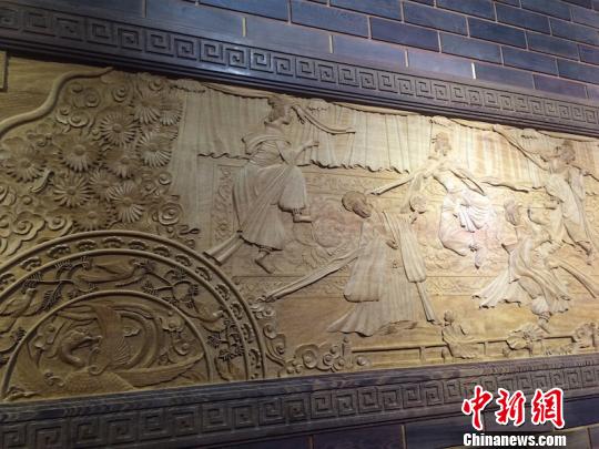 耗时十年完工的23米木刻浮雕丝绸之路亮相东博会