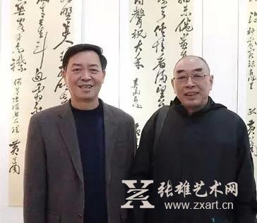  林仲文（左）与厦大教授、黄道周研究专家侯真平（右）合影