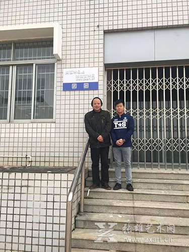 集美大学美术学院院长赵胜利（左)和张雄书画院美术馆馆长陈家心（右）