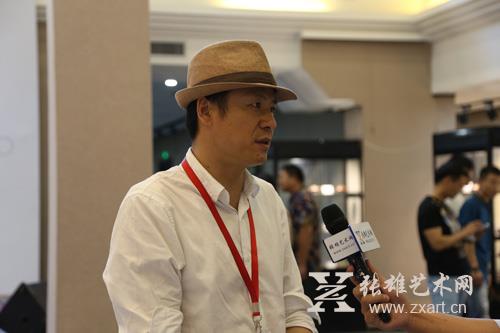 北京翰海拍卖有限公司总监汤云东接受采访