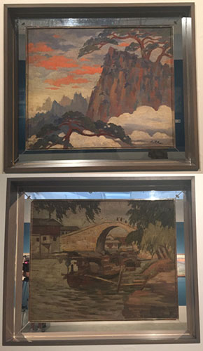 双面油画,一面题为《黄山之云》，一面题为《水乡》。