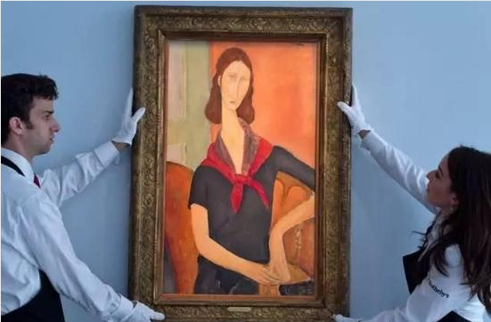 莫迪利亚尼(Amedeo Modigliani)的《珍妮·赫布特尼》(Jeanne Hébuterne [au foulard]，1919) 图片：Courtesy of Sotheby's
