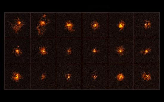 图中每一个巨大的类星体周围都被气体光圈围绕着