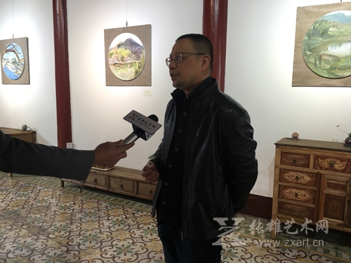 张雄艺术网记者采访泉州师院教师黄曦农