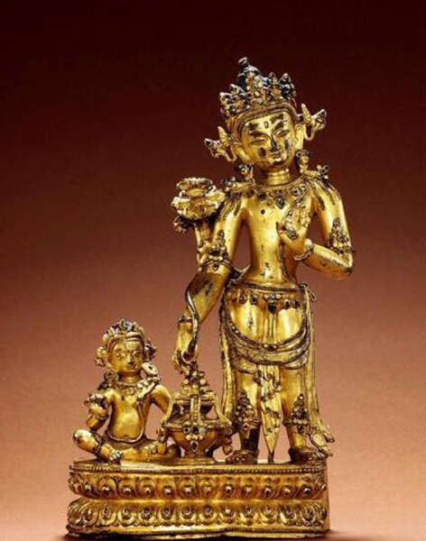  十四世纪 丹萨替风格铜鎏金金刚手菩萨与大成就者像 成交价：437万元