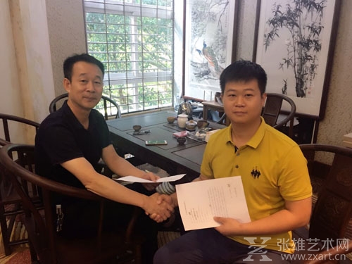   吴盛辉与张雄公司常务副总经理陈家心签订合作协议