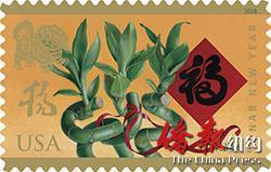 由华裔艺术家麦锦鸿设计的狗年邮票已发售 