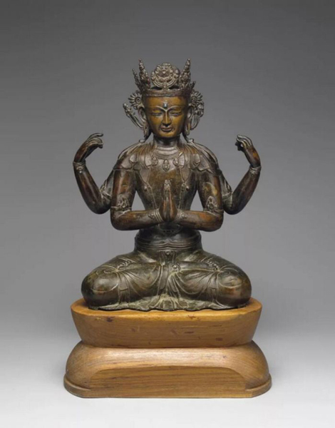 拍品编号308 西藏地区 十五世纪 嵌银与红铜四臂观音菩萨像 高 46 cm. 估价：美元 120,000 - 180,000