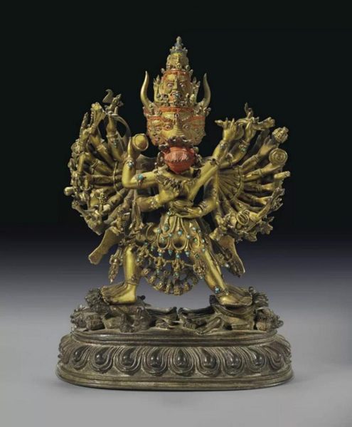 拍品编号303 西藏地区   十六世纪 鎏金铜大威德金刚  高 24 cm.