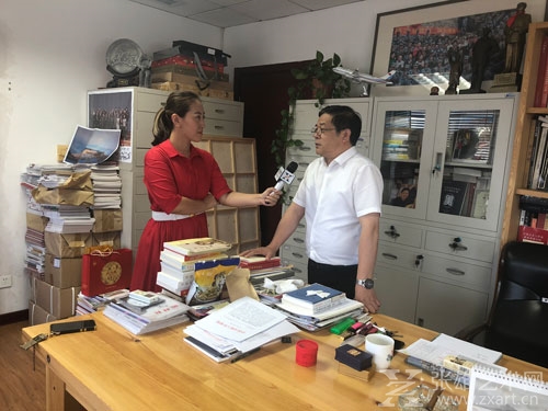 张雄艺术网采访中国美术家协会分党组书记、常务副主席、秘书长徐里